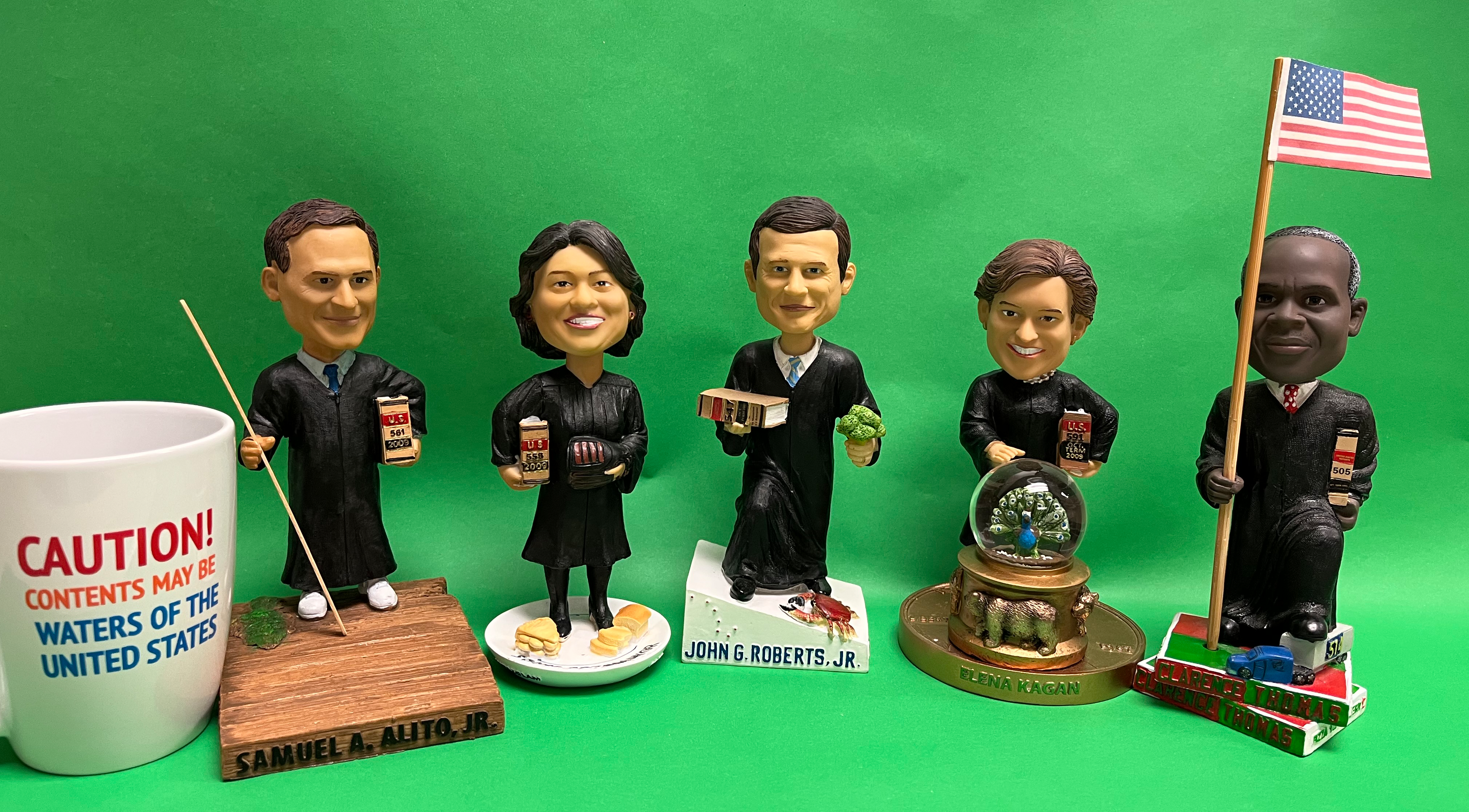 Bobbleheads of Supreme Court Justices Clarence Thomas, Samuel Alito, Elena Kagan, Sonia Sotomayor, and John Roberts.