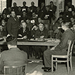 Maj. McKeown questions Father Wieck, prisoner at Dachau